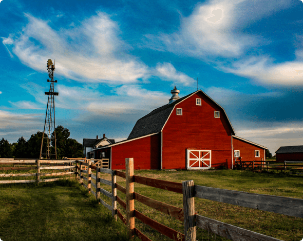 a farm with a red barn