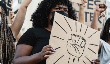 a person holding a sign