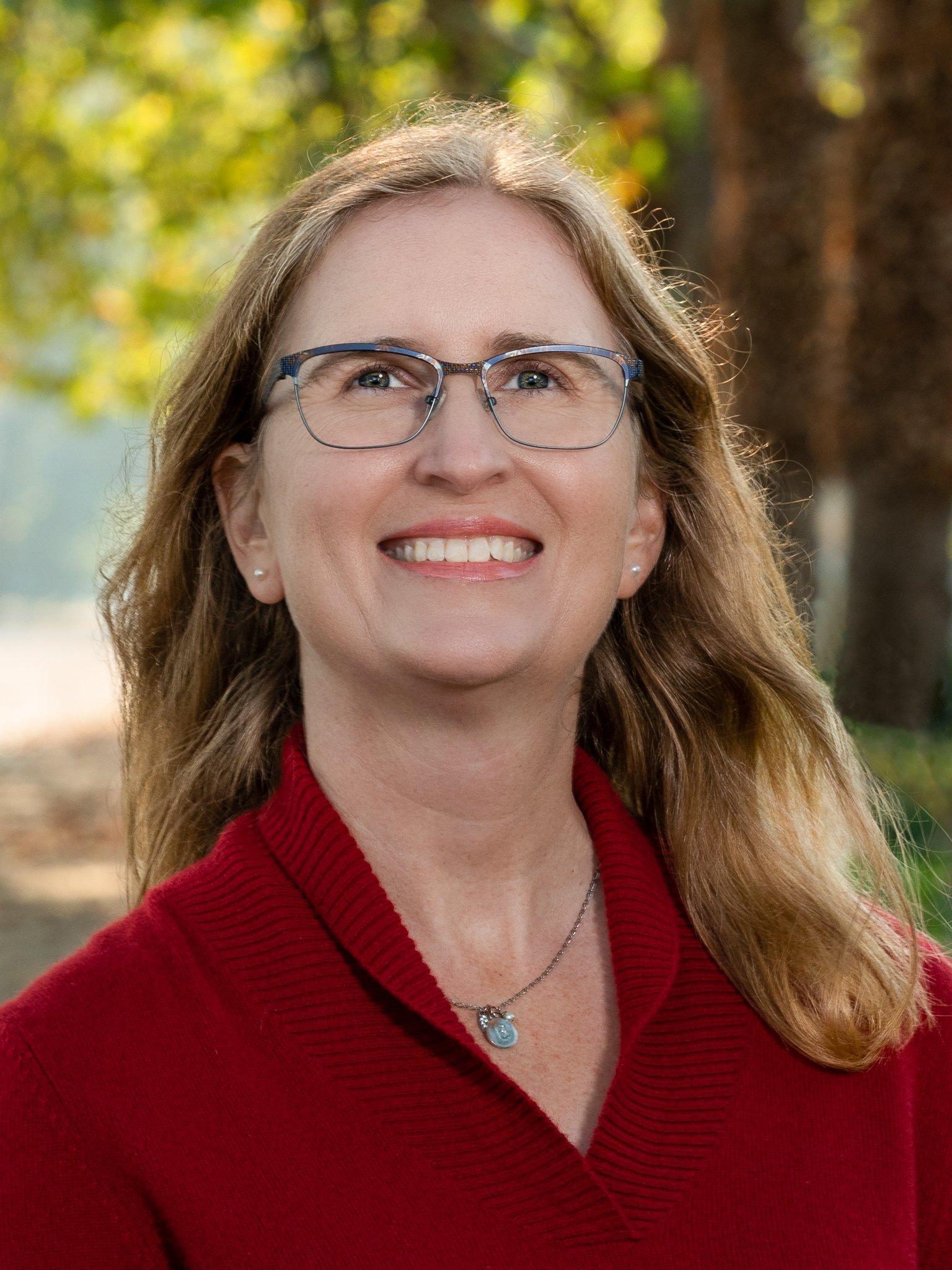 a woman wearing glasses