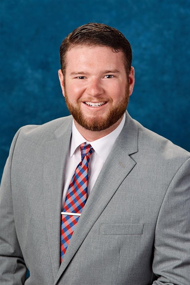 a man in a suit and tie