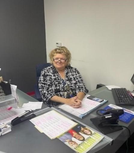 a person sitting at a desk