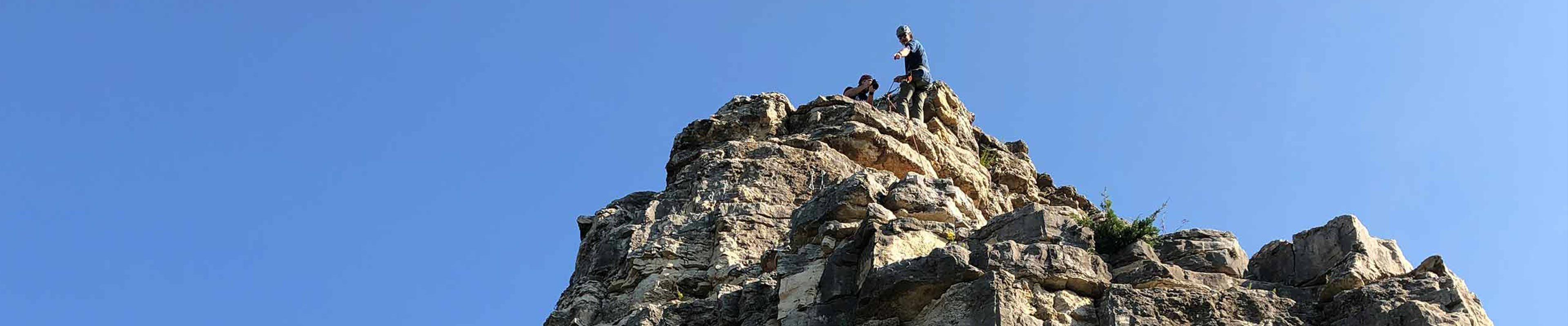 Eric Barnard rock climbing. 