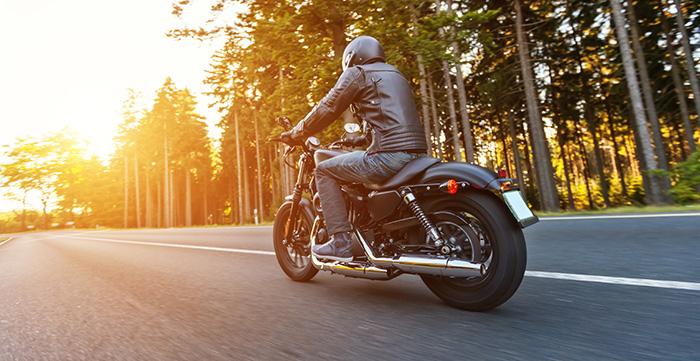 a man riding a motorcycle